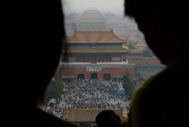 Cina: le settimane dorate mettono a dura prova il patrimonio culturale