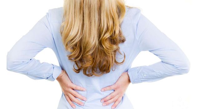 Sindrome premestruale e mal di schiena: le cause e i rimedi efficaci
