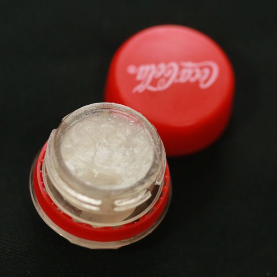 Blister porta burro cacao da tappo Coca Cola