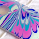 Cover iPhone colorata con water marble