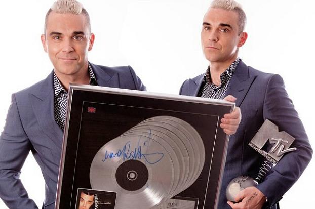 Robbie Williams mette all’asta alcuni suoi oggetti per beneficenza