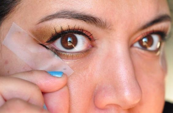 Trucco occhi gatta nastro adesivo